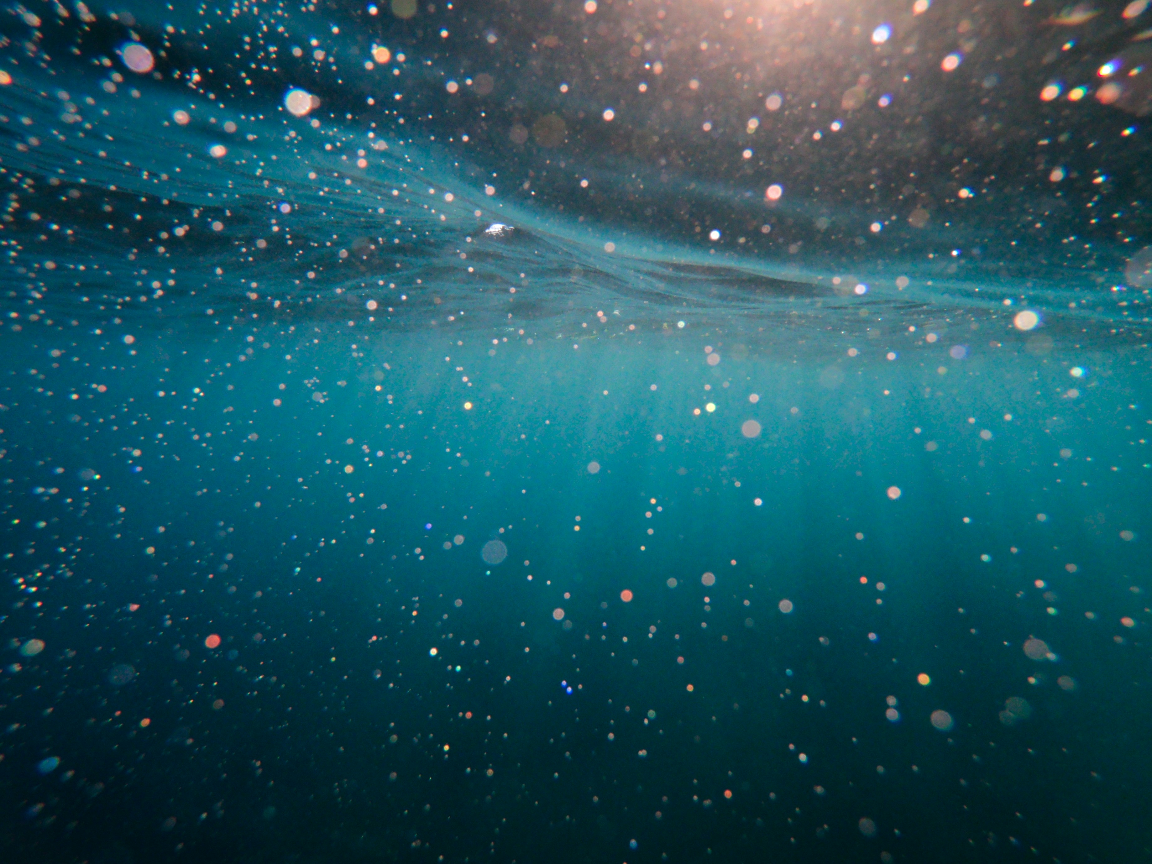 An abstract underwater shot of blue water