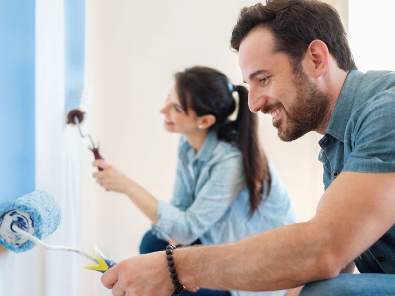 Couple Painting Their Wall Blue