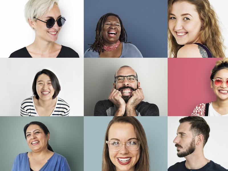 A grid of many different smiling faces from an ethinically diverse group of people